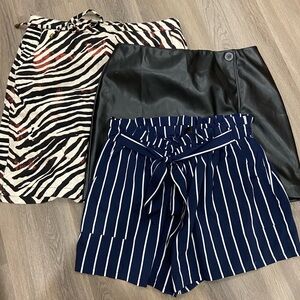 Value Bundle of 3.   2 skirts and 1 shorts excellent condition
